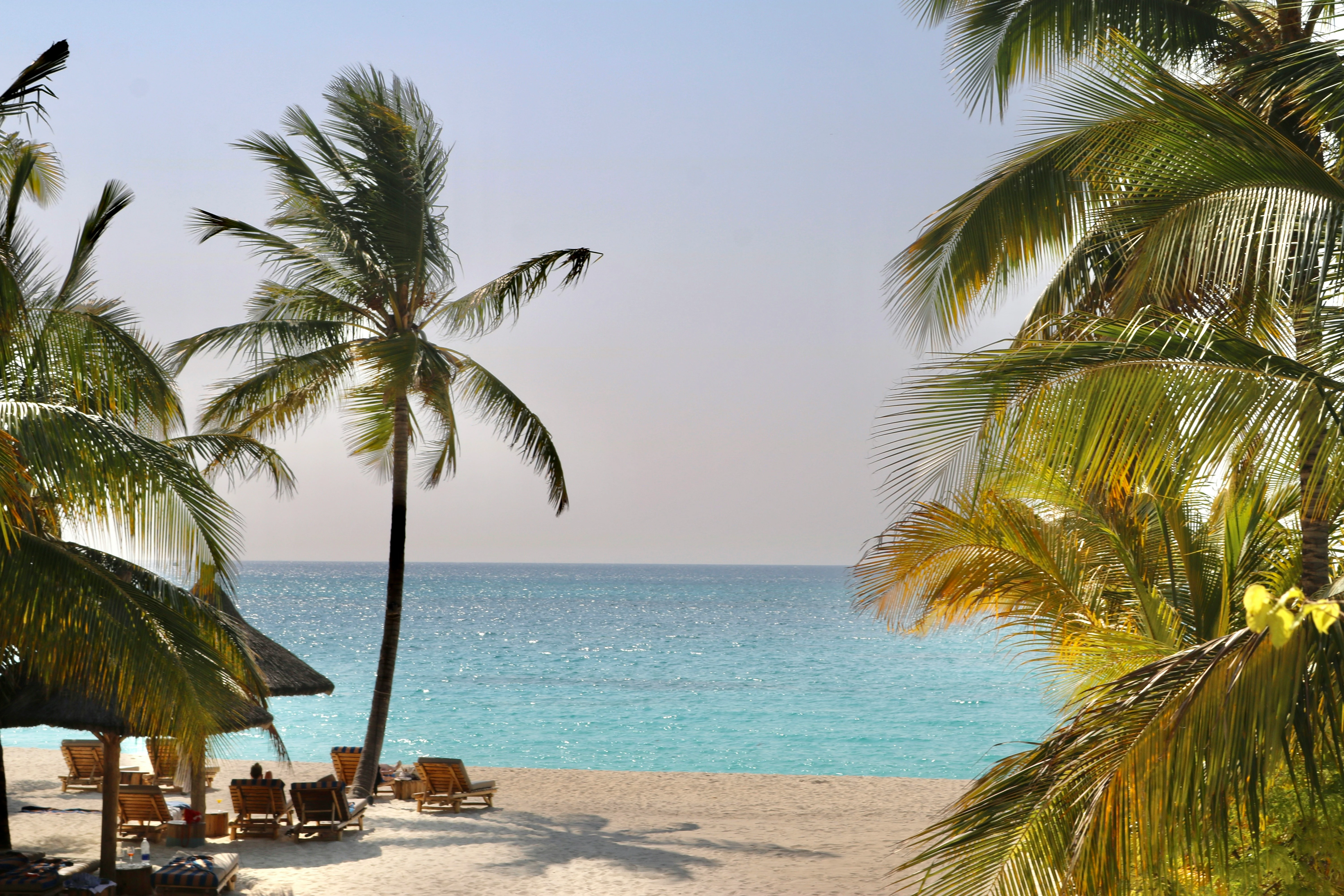 Explore Nungwi Beach with Zanzibar car rental services from Kizingo Cars - Enjoy the stunning white sand and crystal-clear waters